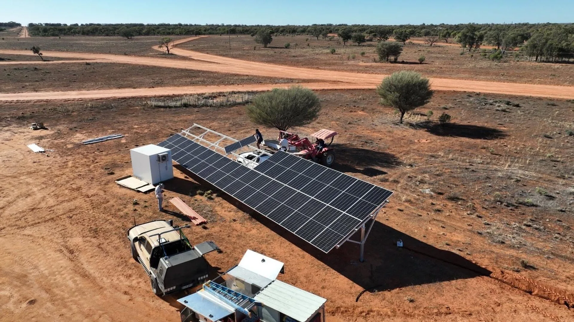 Elec One ground-mounted solar array being installed on a rural property
